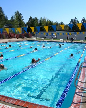 A photo of people swimming in the pool